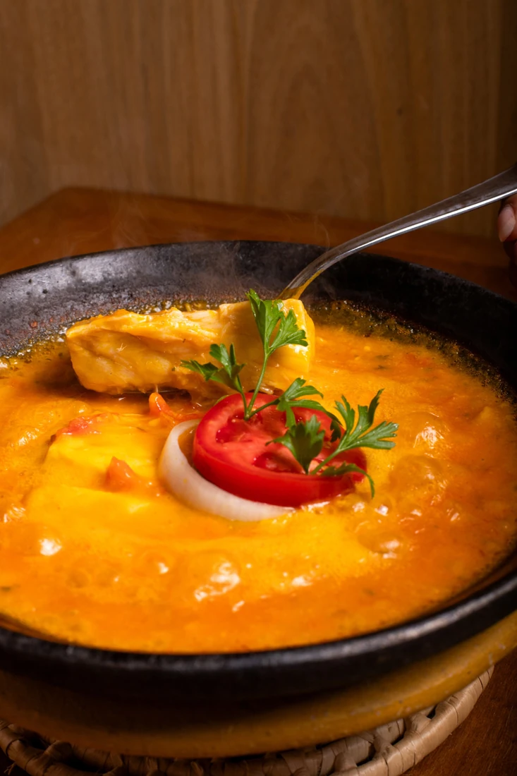 Moqueca ou Ensopado de Pescada Amarela — foto do cardápio Ki-Mukeka
